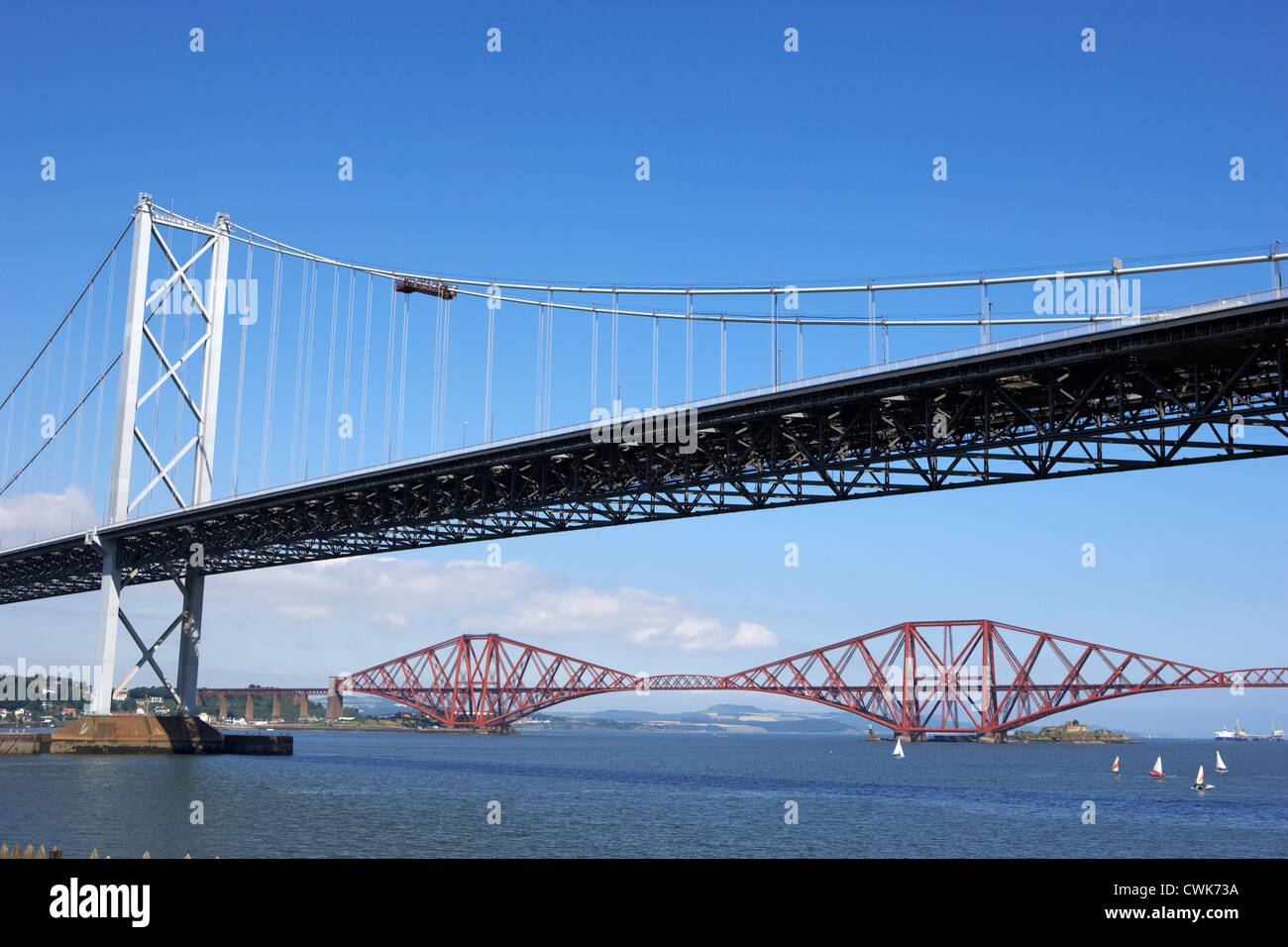 firth of forth bridges forth road bridge in foreground rail bridge in background scotland uk united kingdom Stock Photo