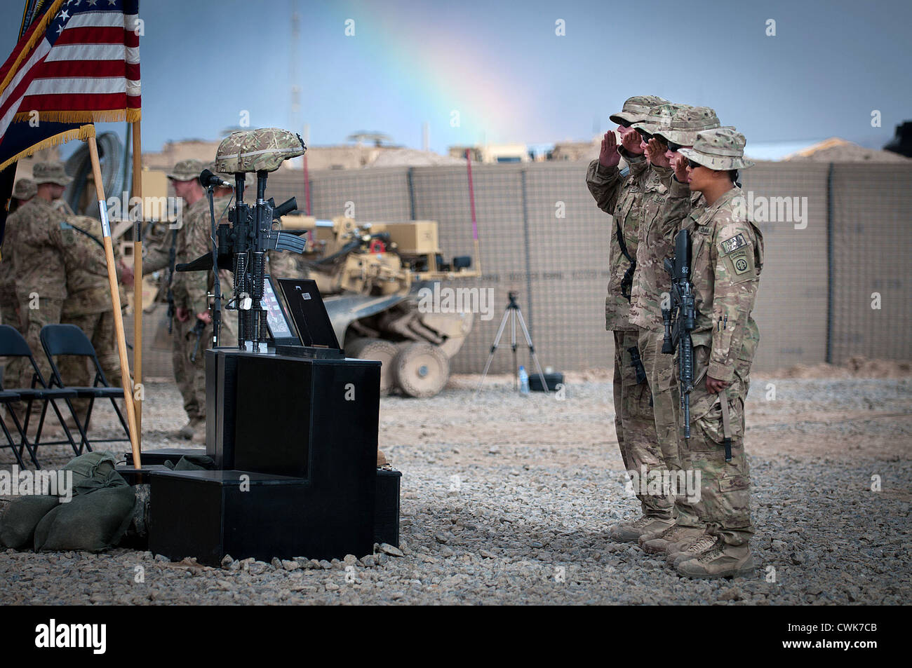 Paratroopers pay their respects to two fallen soldier during a memorial on Forward Operating Base Arian, April 27, 2012, Ghazni province, Afghanistan. Stock Photo