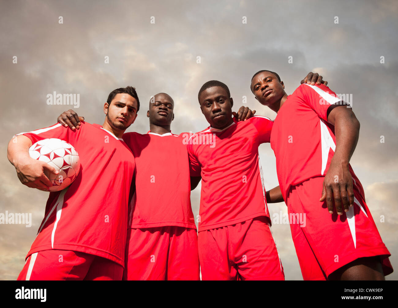Soccer players standing together Stock Photo