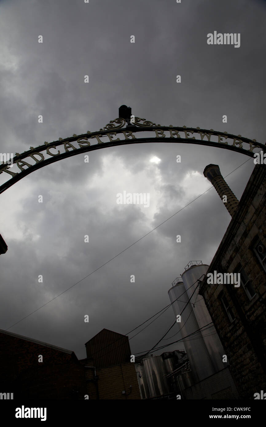 The ornamental wrought iron gates at Tadcaster brewery silhouetted