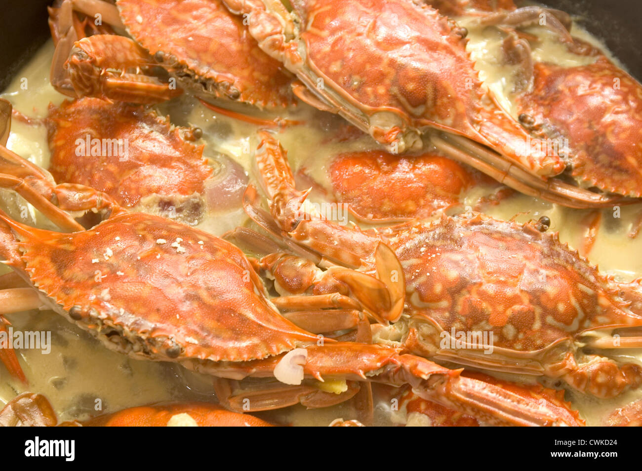 Crabs cooked in coconut milk Stock Photo Alamy
