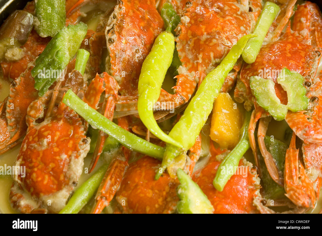 Crabs cooked in coconut milk Stock Photo Alamy