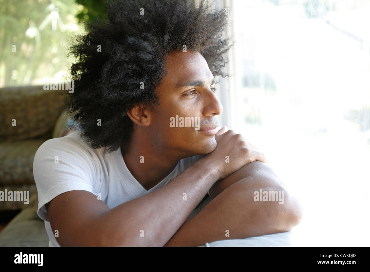 Afro cuban man sitting hi-res stock photography and images - Alamy