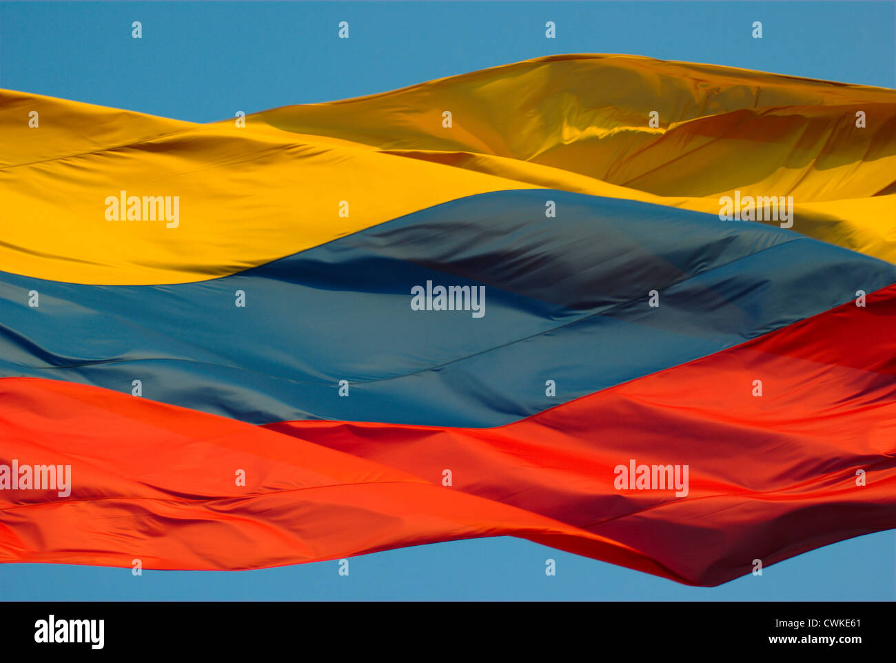 Yellow-blue-red striped Colombian flag moving in the wind Stock Photo