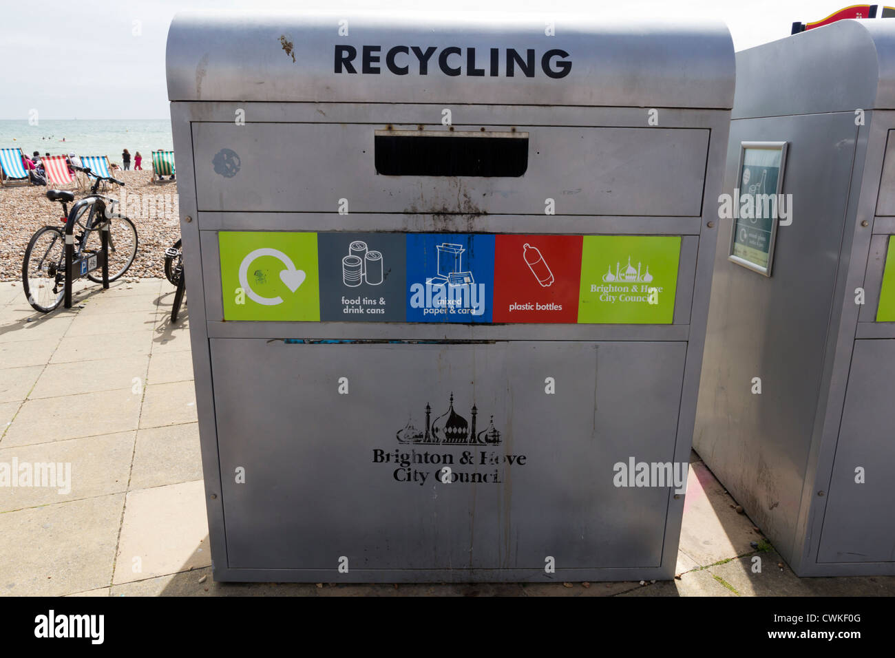 Recycling bin on Brighton beach for tins, cans, paper, card and plastic bottles. Stock Photo