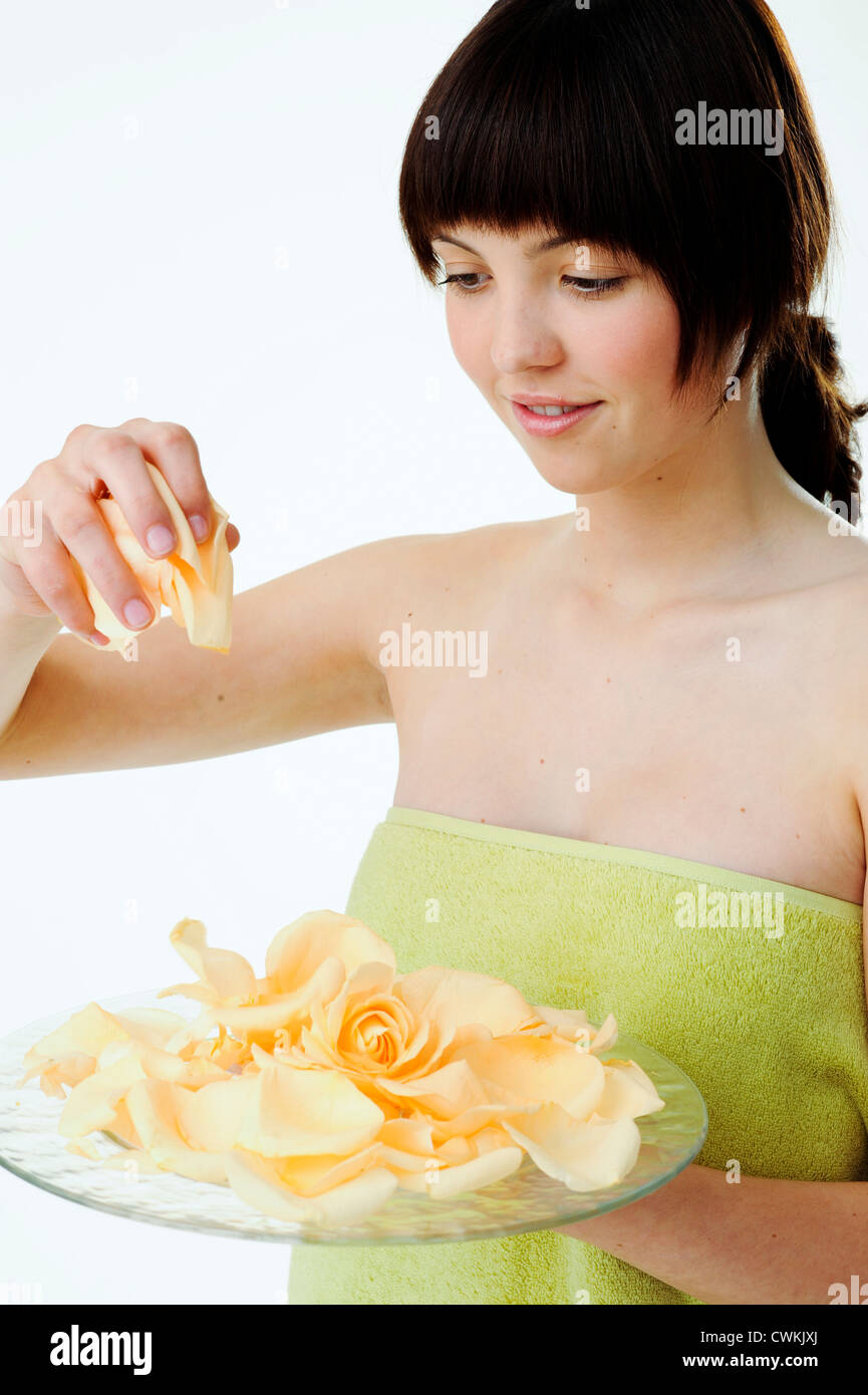 Young Woman Carrying Rose Petals Stock Photo Alamy