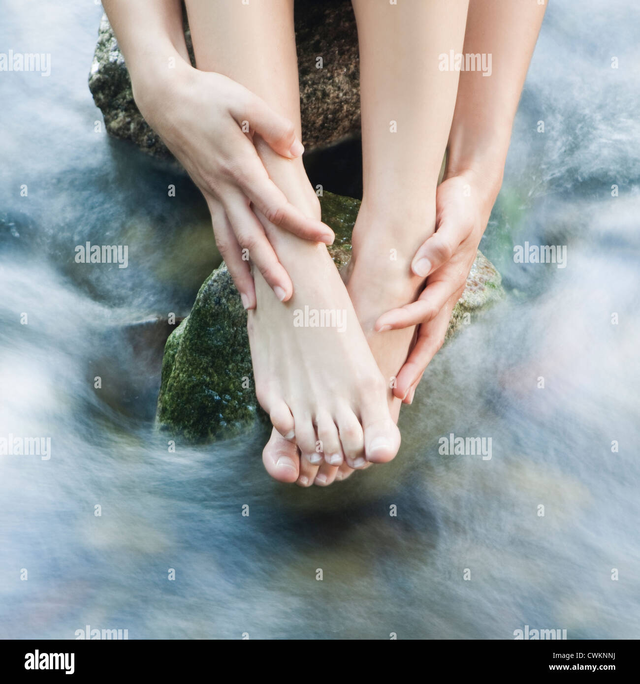 woman feets in a creek Stock Photo - Alamy