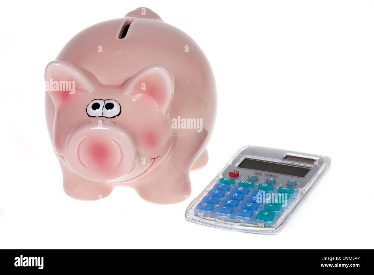 Smiling Pink piggy bank and a modern pocket calculator isolated on white background Stock Photo