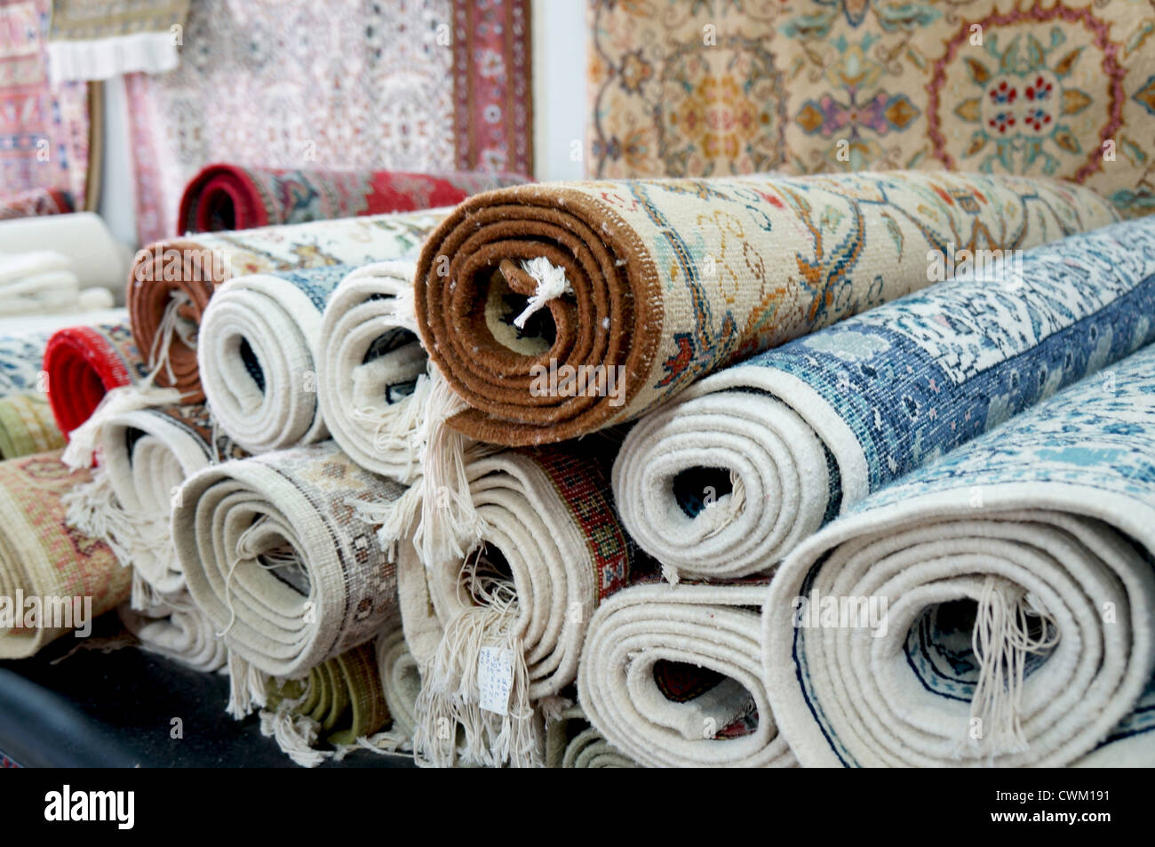 Handmade carpets in a bazaar of the tunisian Kairouan Stock Photo