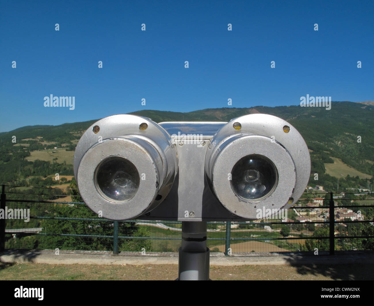 Public binoculars looking like eyes in Accumoli Italy Stock Photo Alamy