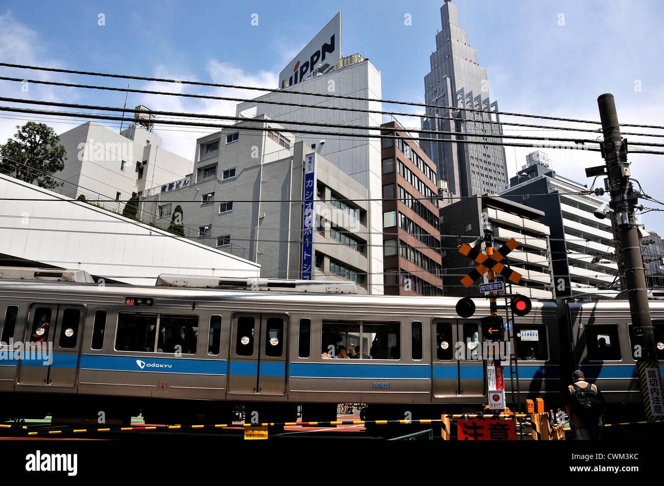 street scene, railroad crossing, Shinjuku, Tokyo, Japan Stock Photo