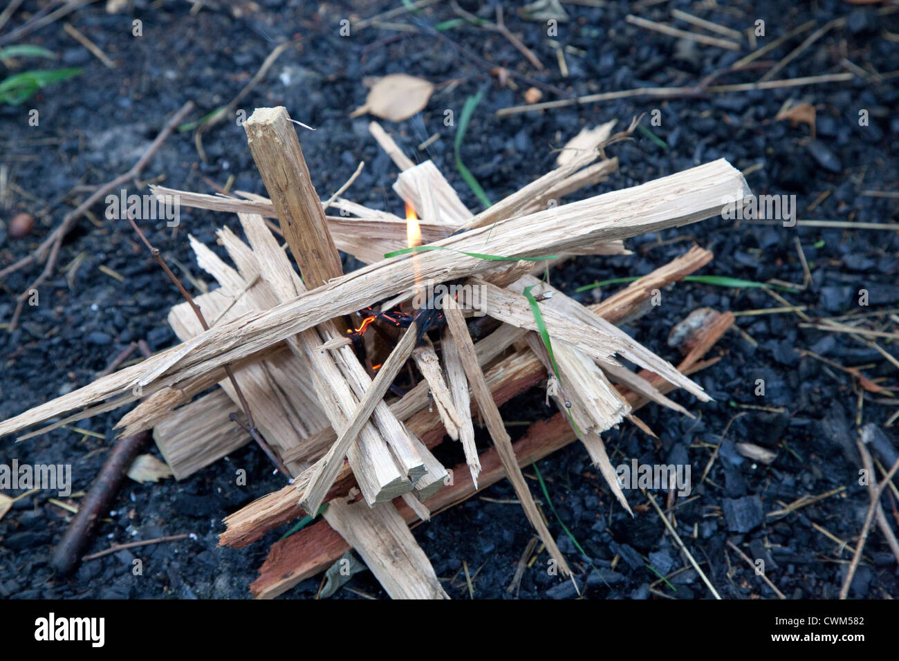 Fire starting from a square orderly small split pieces of kindling wood