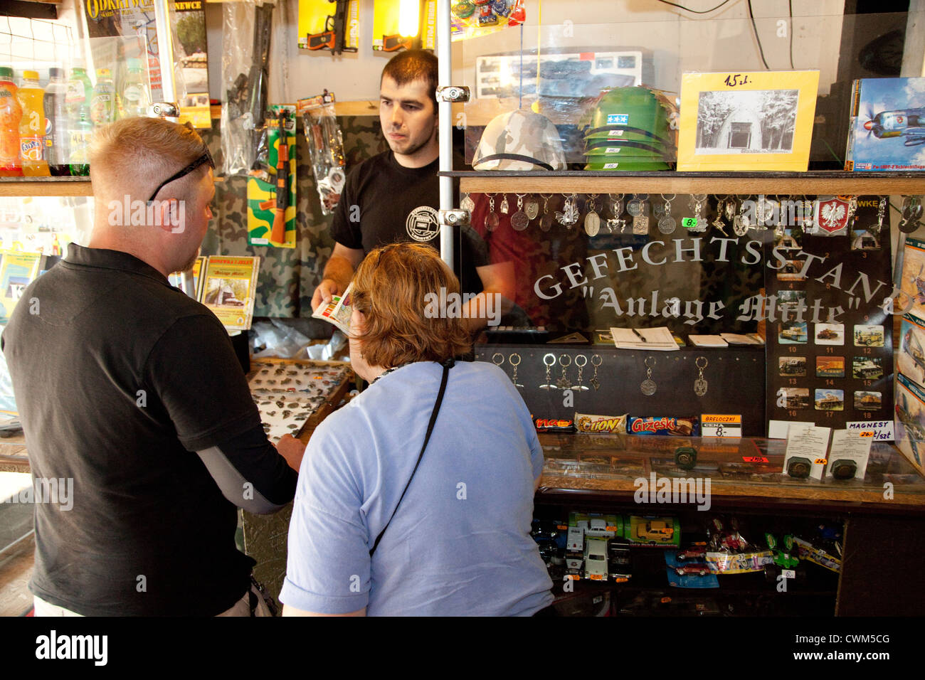 Tourists buying war trinkets at the entrance of Hitler's Bunker. Konewka Central Poland Stock Photo
