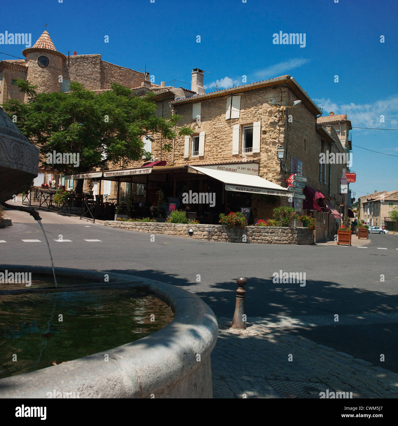 The Centre Of The French Wine Making Village Of Chateauneuf Du Pape With A Drinking Water Fountain In The Heat Of Summer Stock Photo Alamy