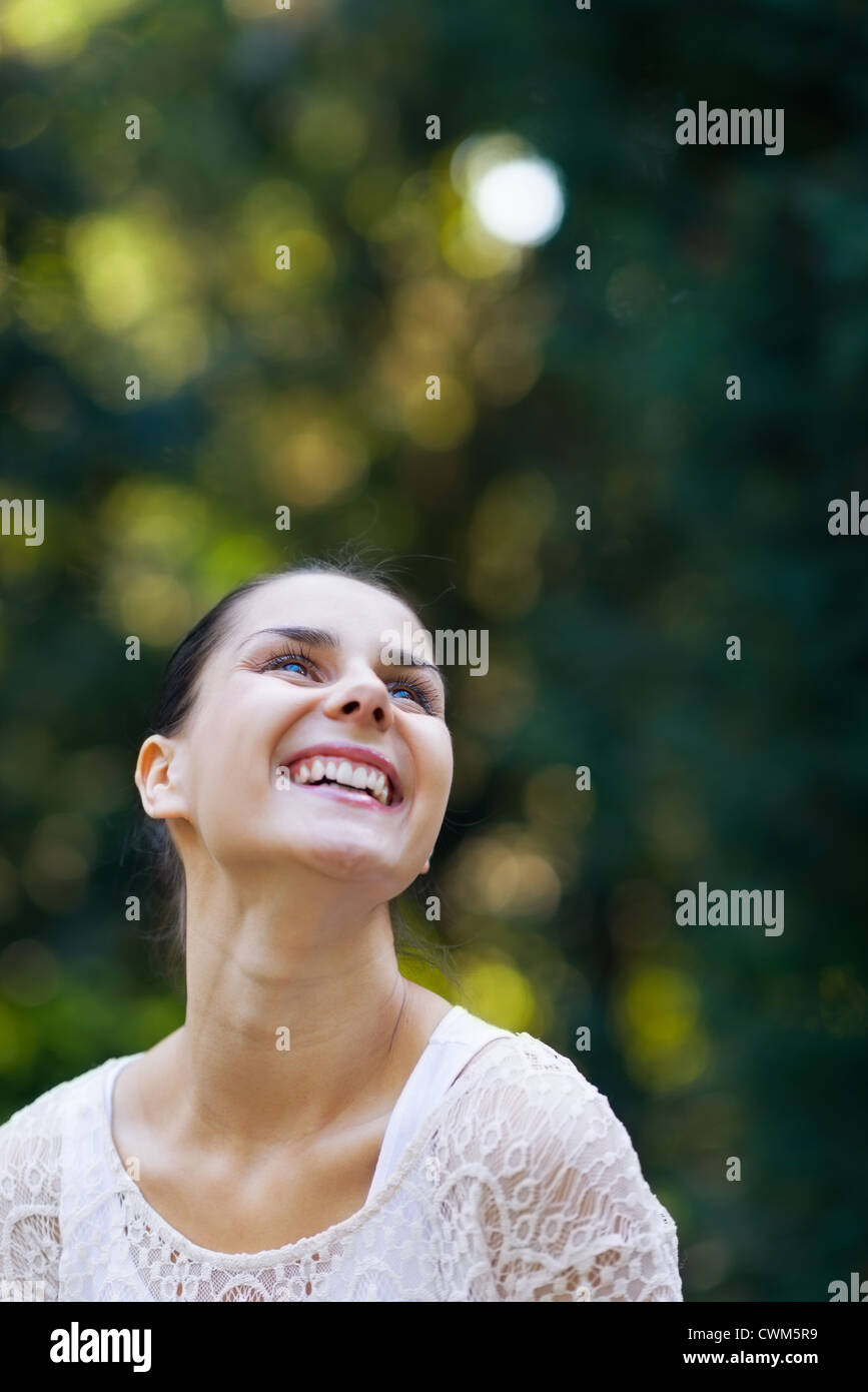 Portrait of smiling girl in woods Stock Photo - Alamy