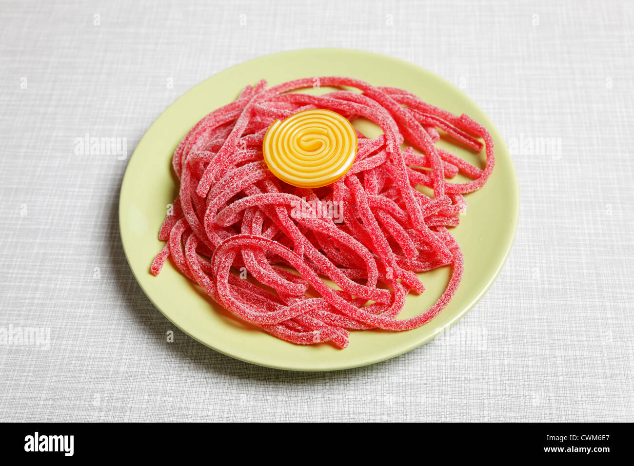 Germany, Candy noddle in plate, close up Stock Photo