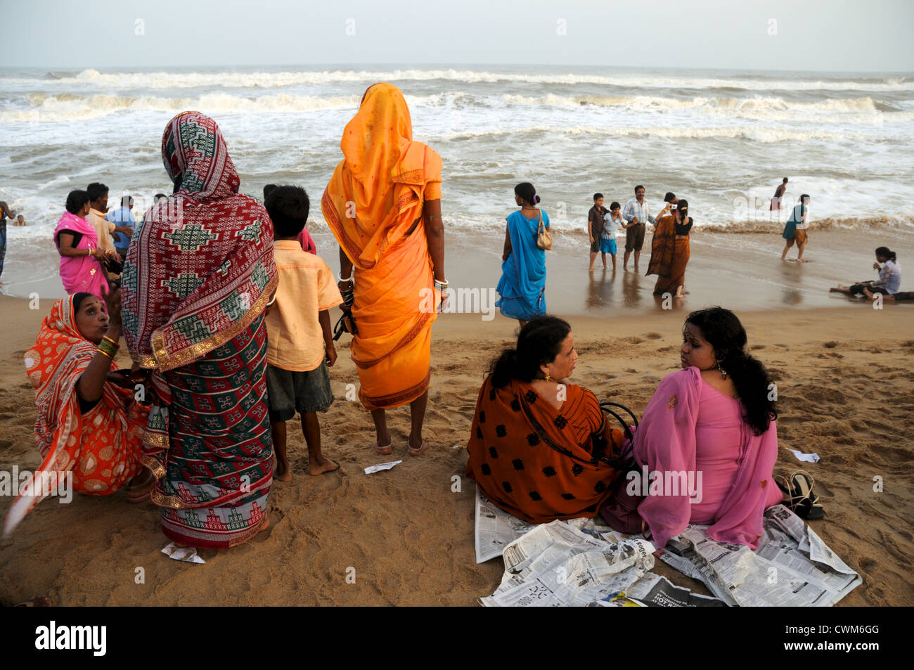 Indian families take a visit to the seaside. Stock Photo