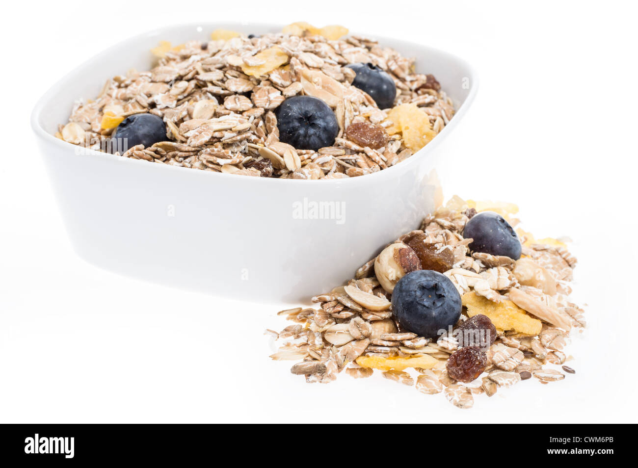 Fruit muesli in bowl Cut Out Stock Images & Pictures - Alamy