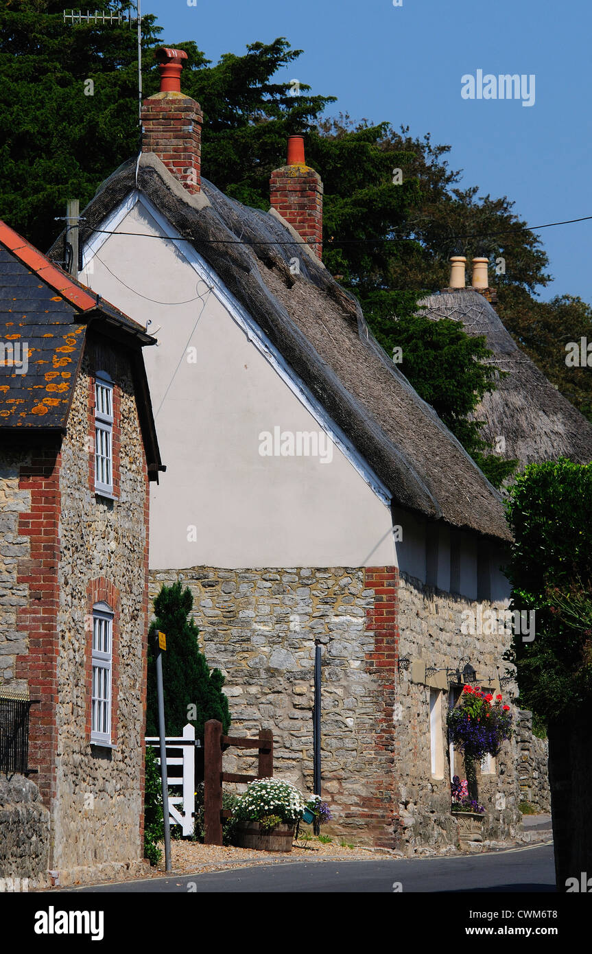 A view of thatched cottages at West Lulworth Dorset UK Stock Photo