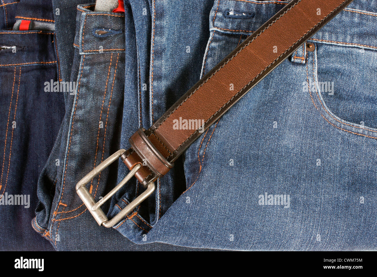 Brown leather belt and blue jean Stock Photo Alamy
