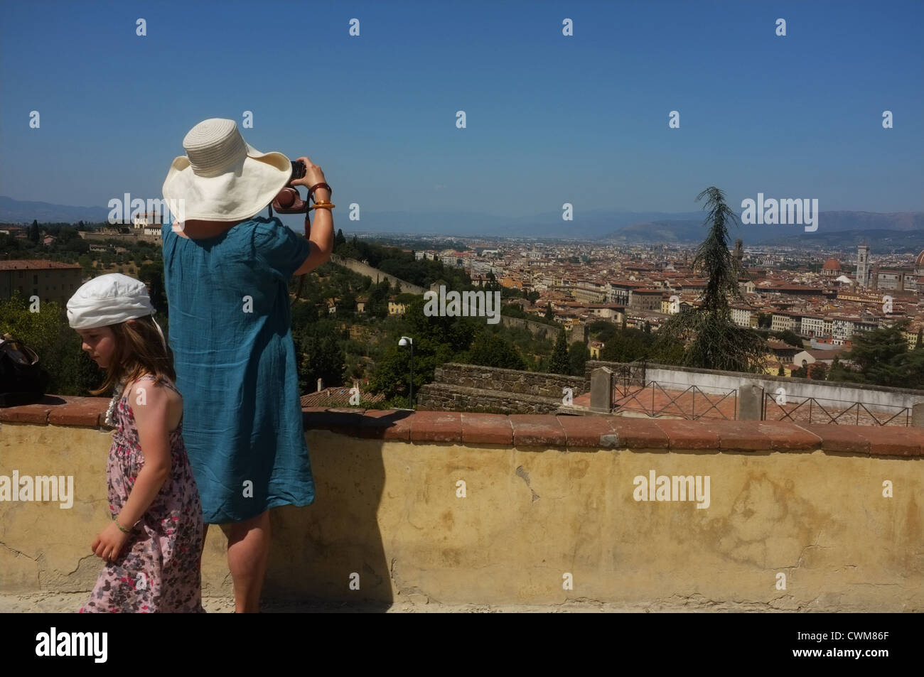 Mother and child sightseers on holiday at piazzale michelangelo, Florence Italy Stock Photo