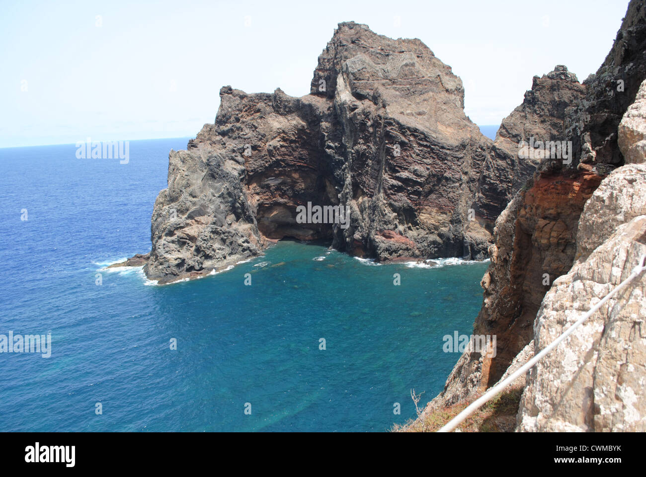 Image of volcanic rocks in blue ocean in Madeira Portugal Stock Photo