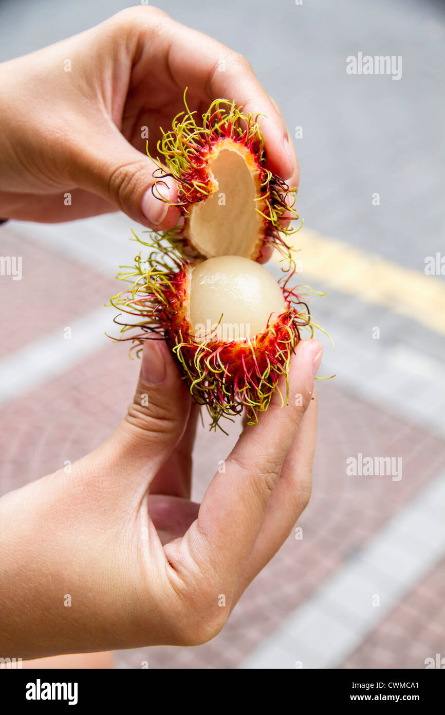 How To Open Rambutan Malaysia fruit hi-res stock photography and images - Alamy