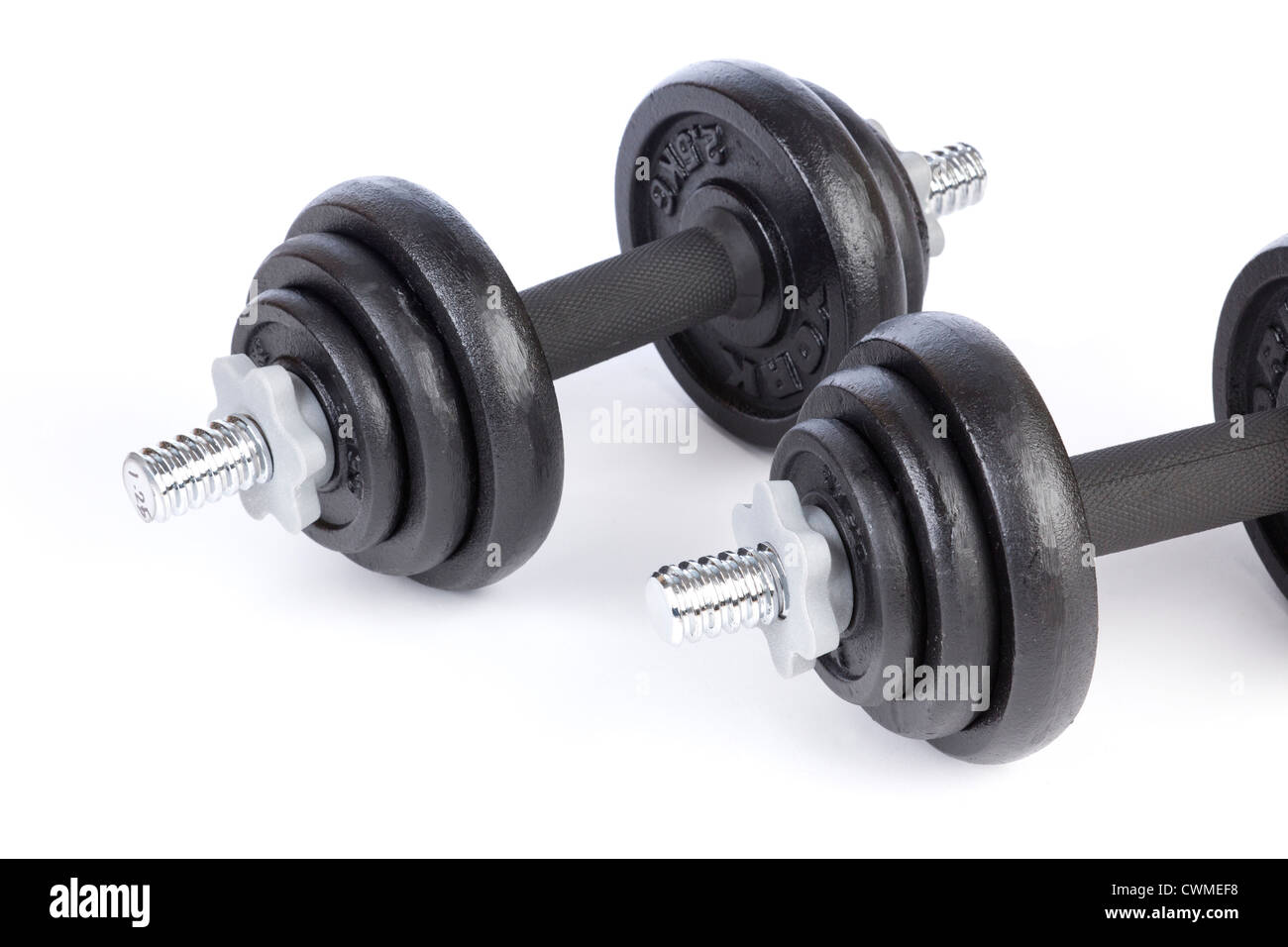 dumbbell weights made of cast iron Stock Photo Alamy