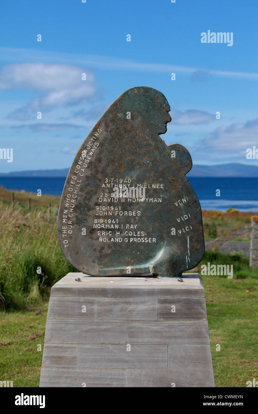 The Churchill Barriers memorial stone to those who dies in its creation in the Orkney Islands, Scotland Stock Photo