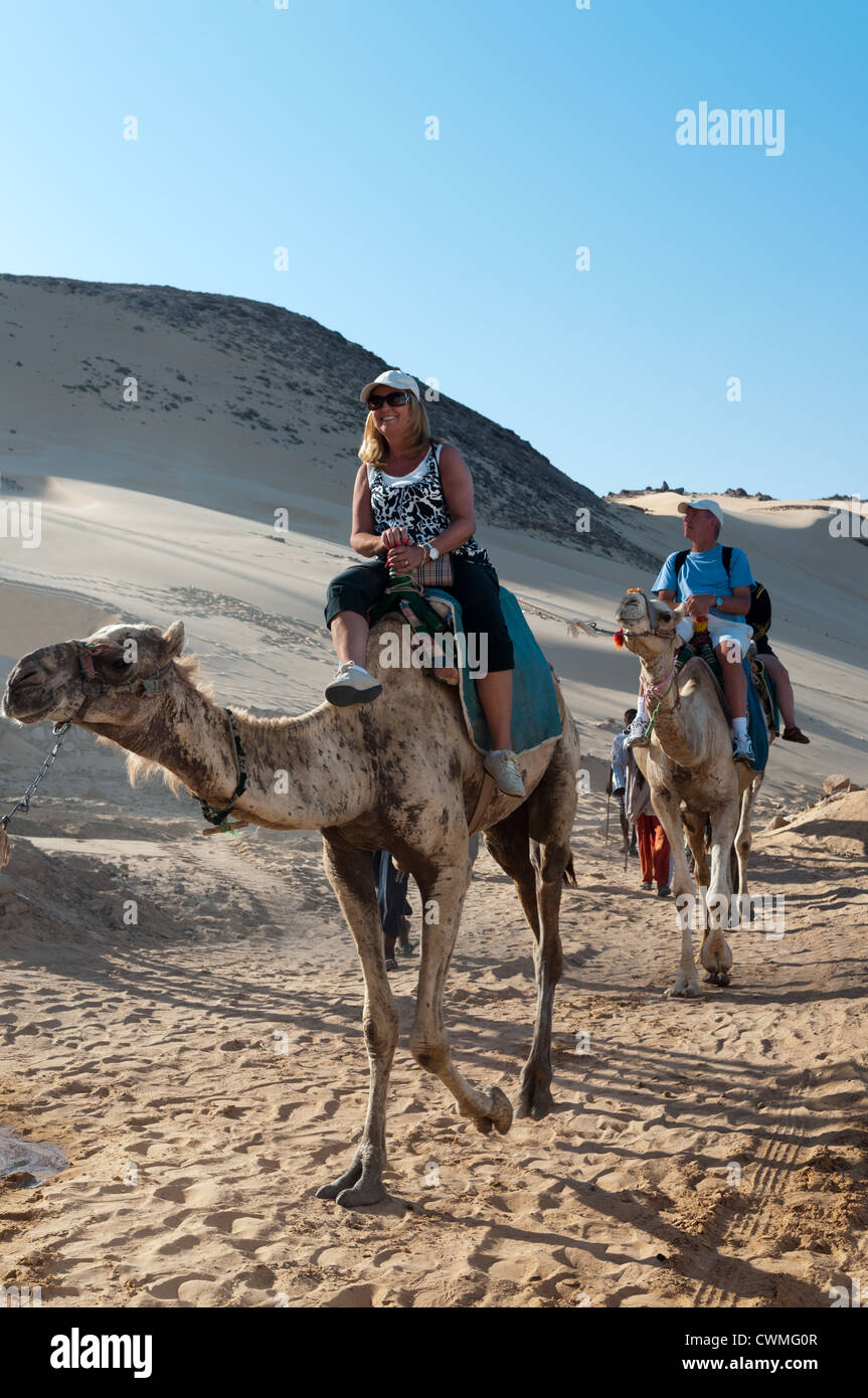 Foreigners riding camels hi-res stock photography and images - Alamy