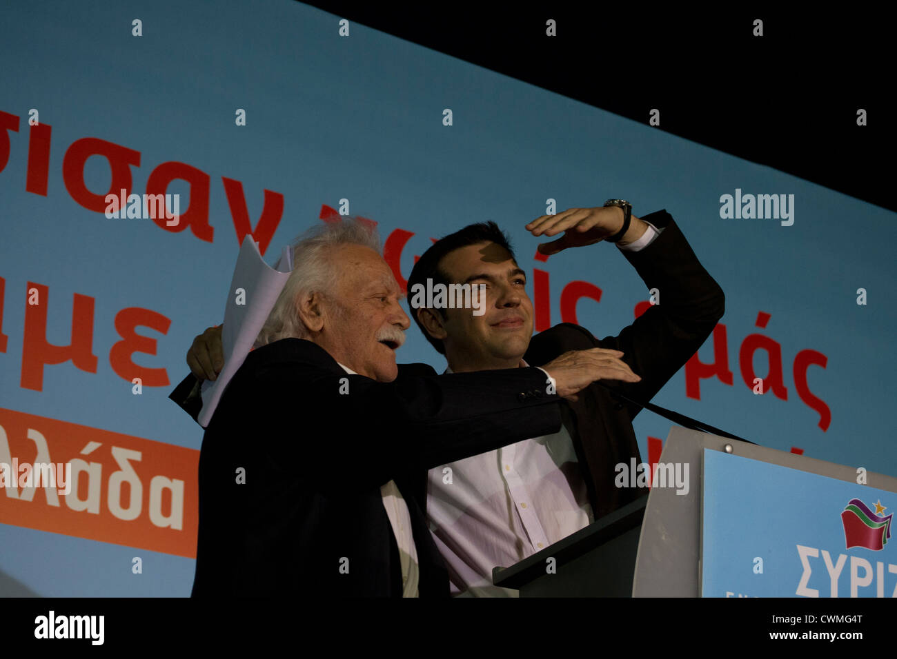 WW2 hero Manolis Glezos with SYRIZA leader Alexis Tsipras greet the party's supporters during a pre-election rally. Stock Photo