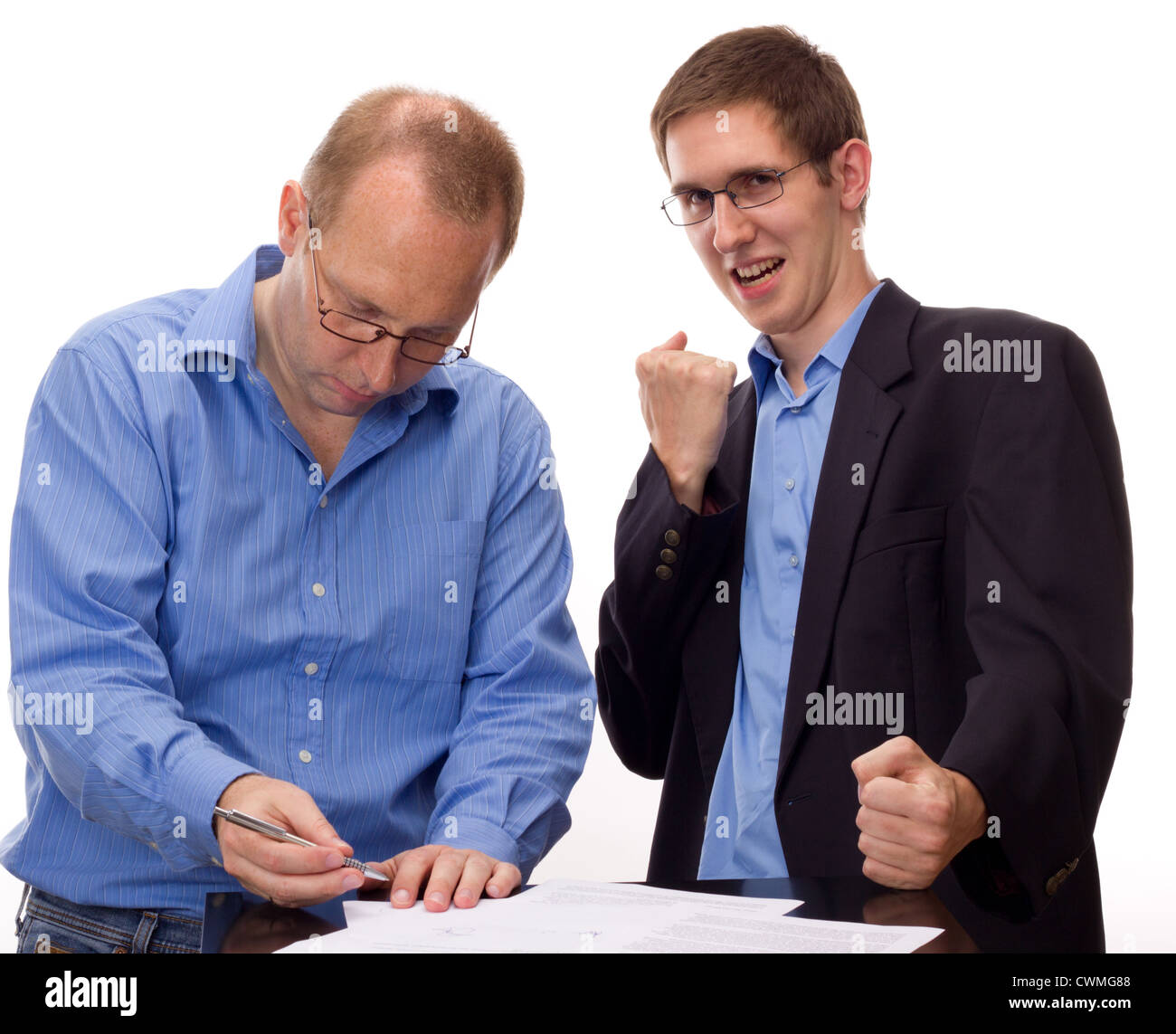 Person signing of an agreement Stock Photo