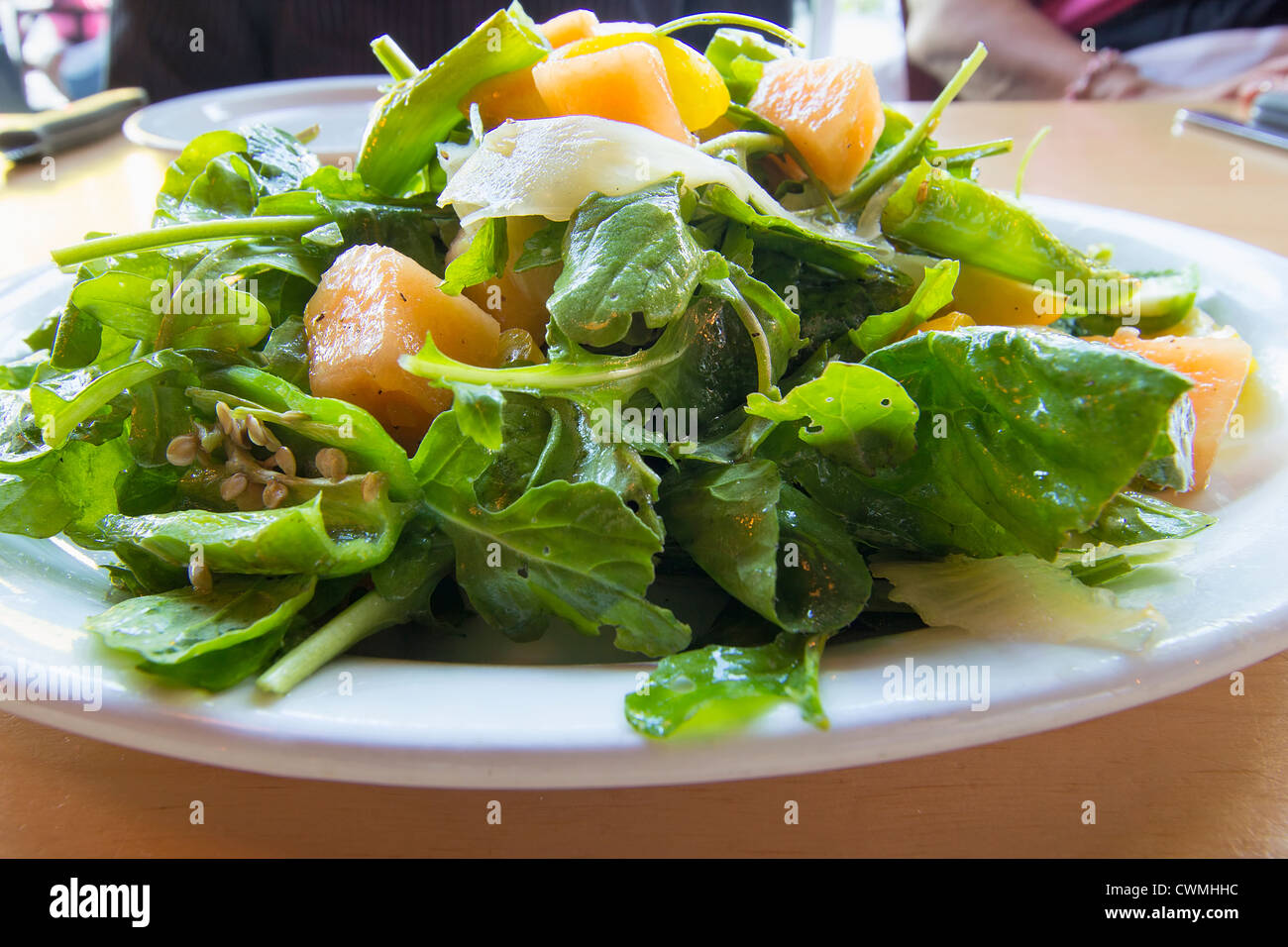 Heirloom Melons with Arugula Greens Salad with Balsamic Vinegar Dressing Stock Photo