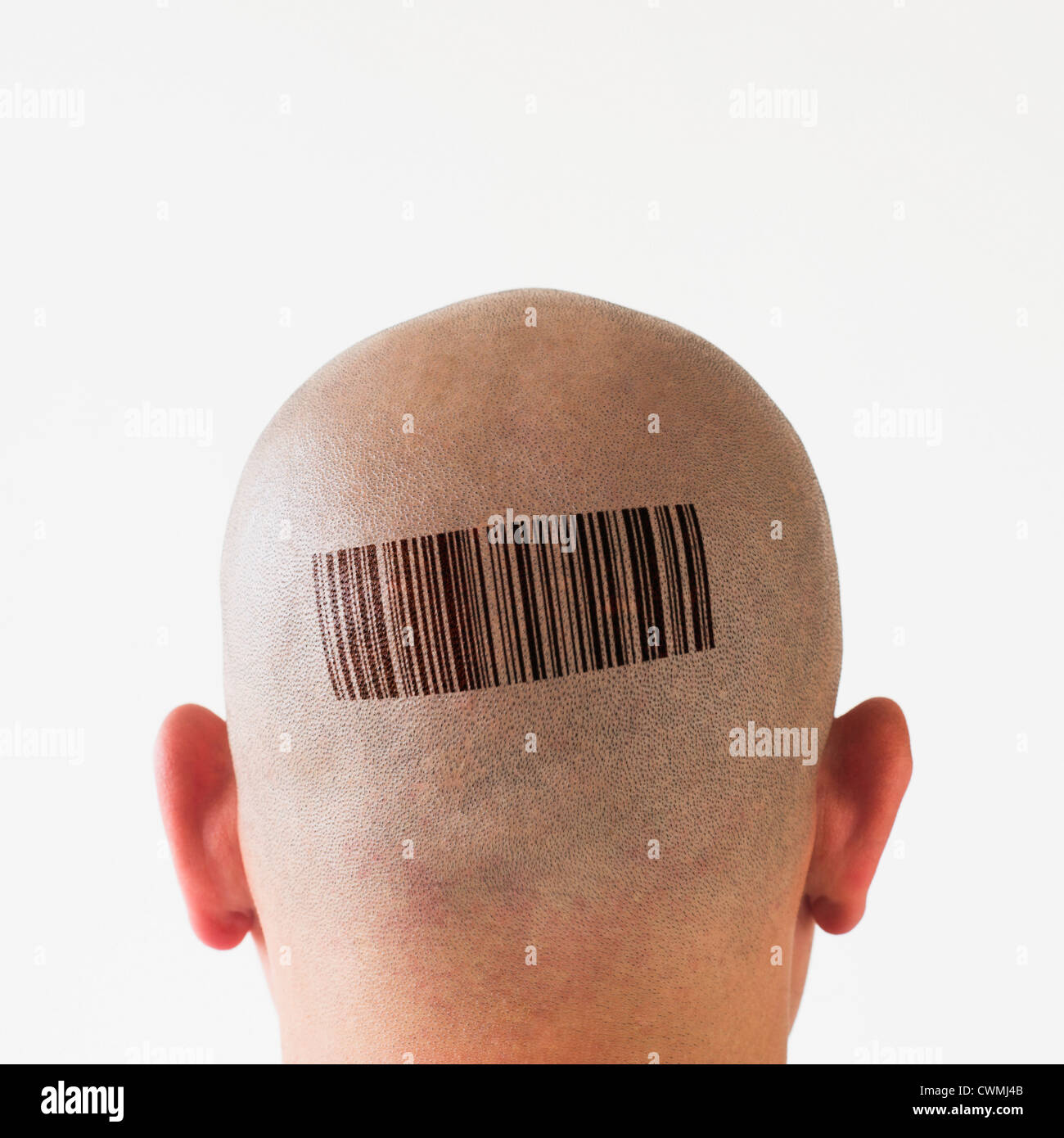 Back view of man with bar code on head Stock Photo