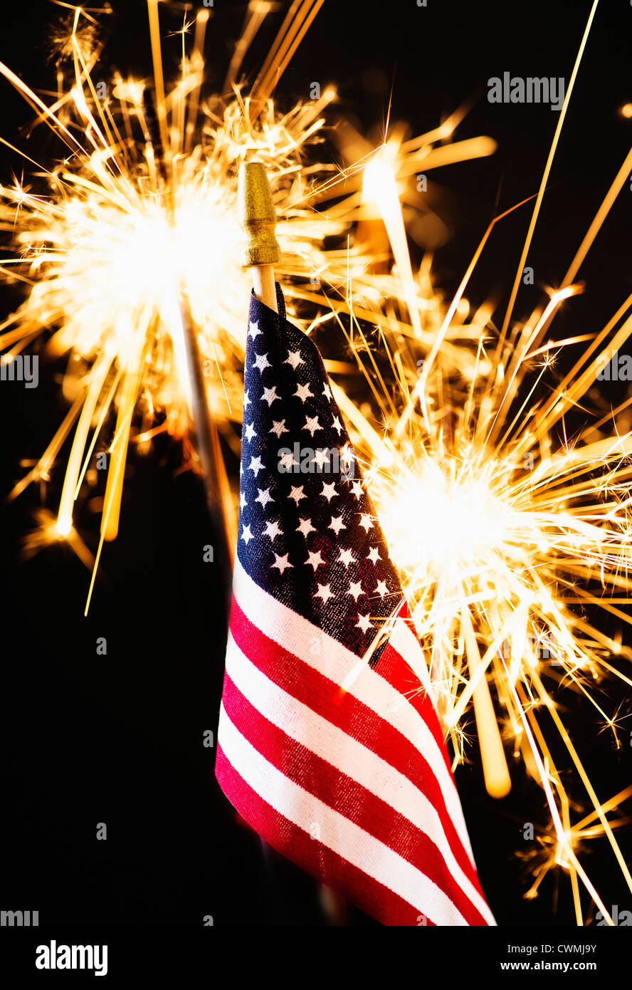 Sparkler and American flag an black background Stock Photo - Alamy