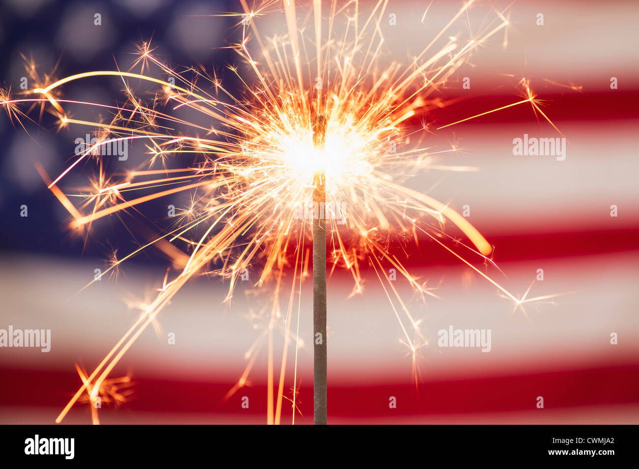 Sparkler and American flag Stock Photo - Alamy