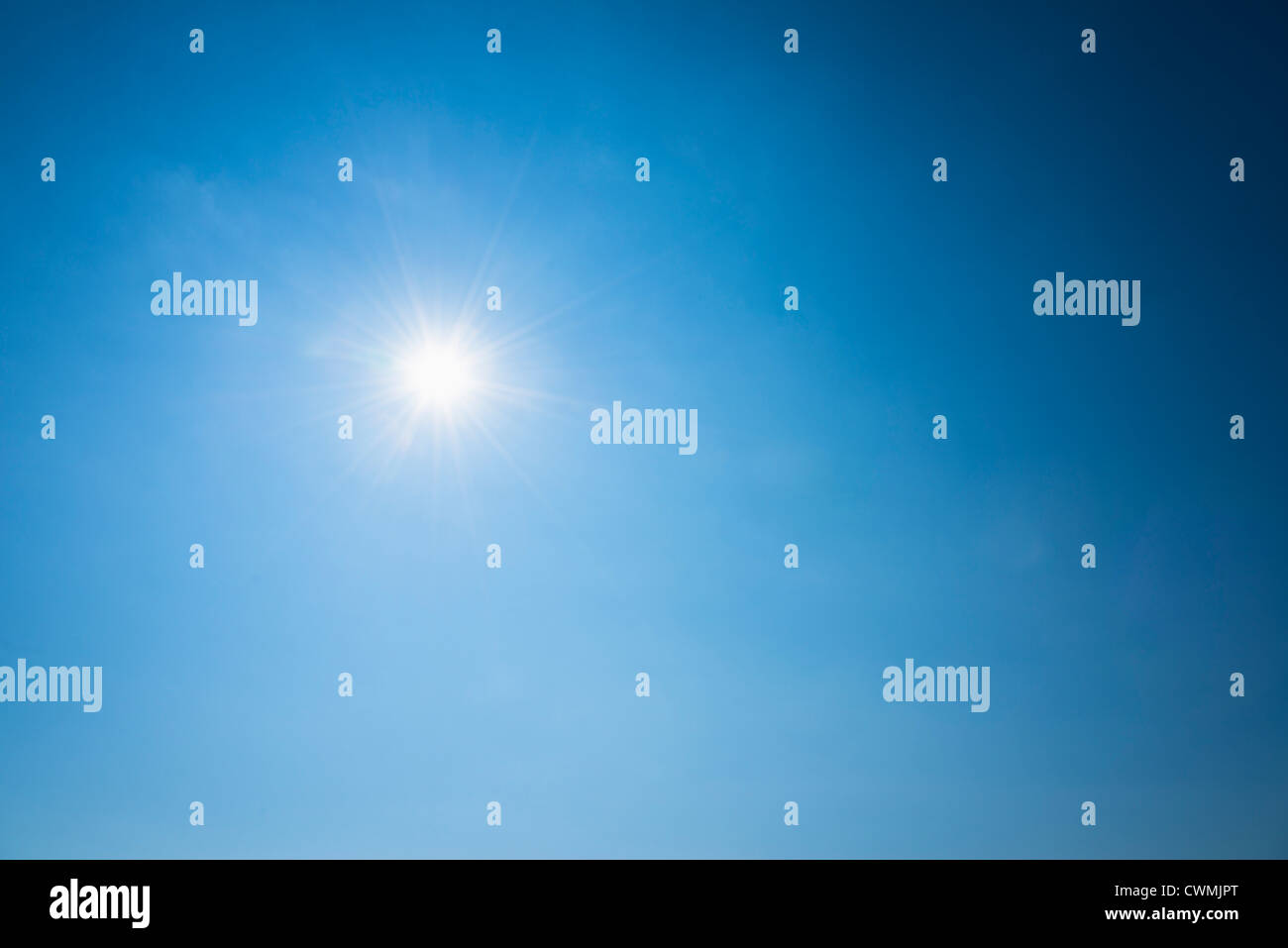 Clear blue sky and solar flare Stock Photo