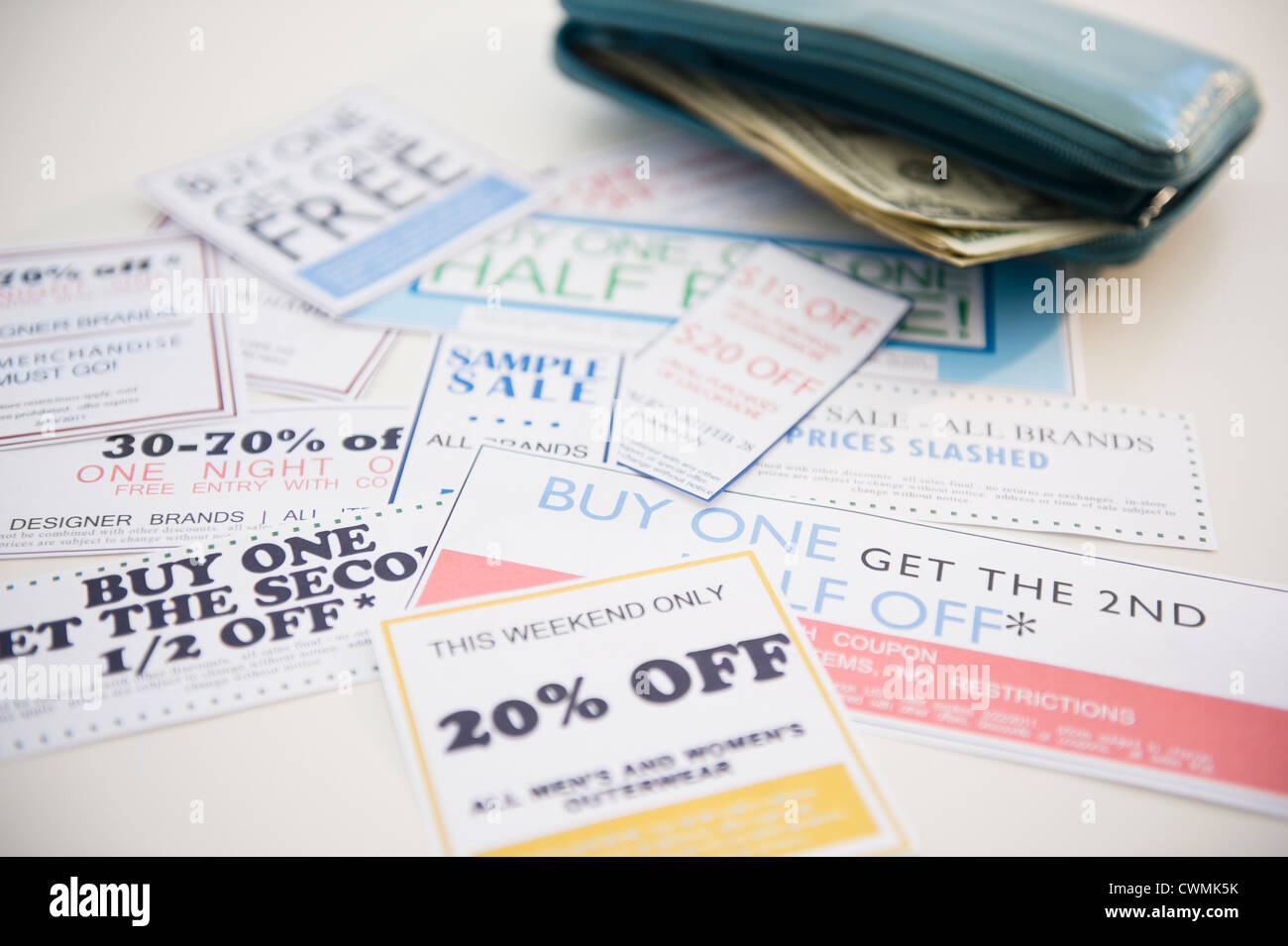 Wallet and discount offer leaflets Stock Photo Alamy