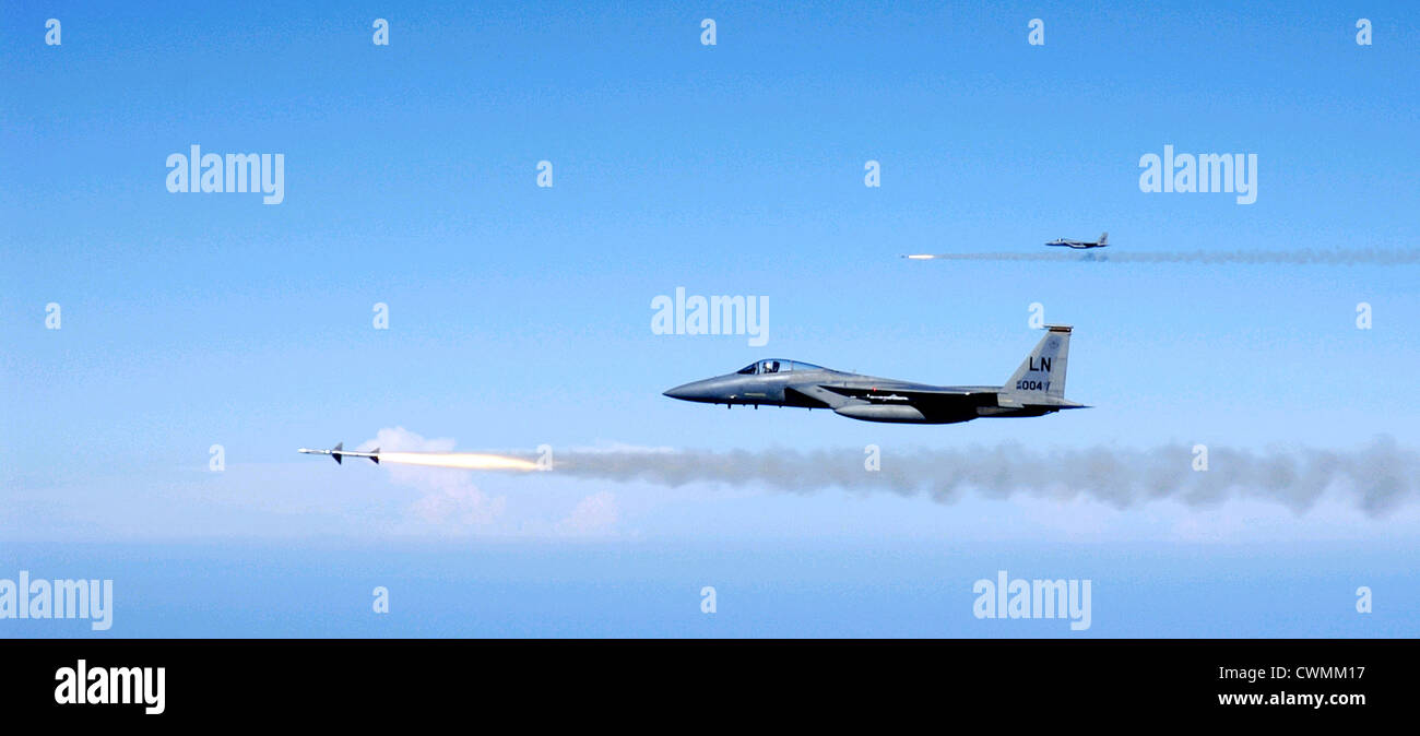 F-15C Eagles Pilots fire AIM-7M Sparrow medium range air-to-air missiles GULF OF MEXICO Stock Photo