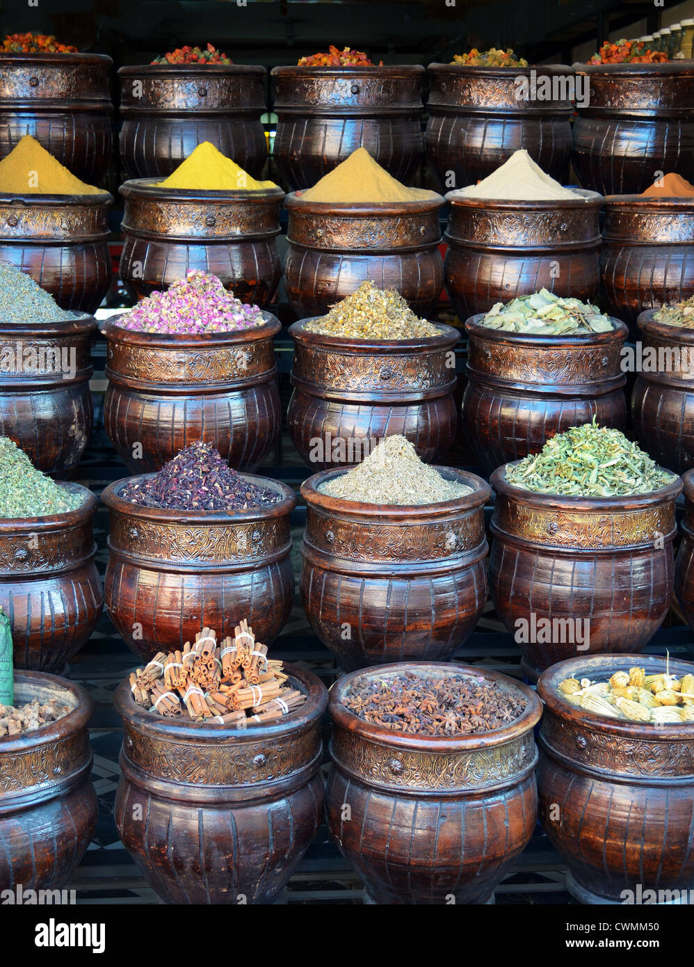Colorful basket full of spices in traditional market or shop Stock