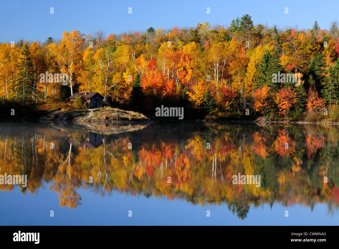 Autumn reflections in St. Pothier Lake, Greater Sudbury, Ontario, Canada Stock Photo