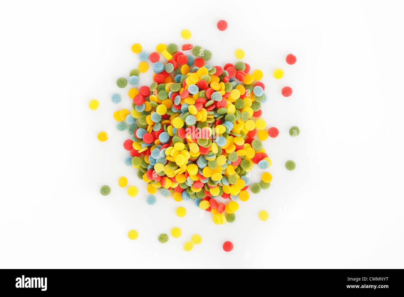 multicolored sprinkles topping on white background Stock Photo Alamy