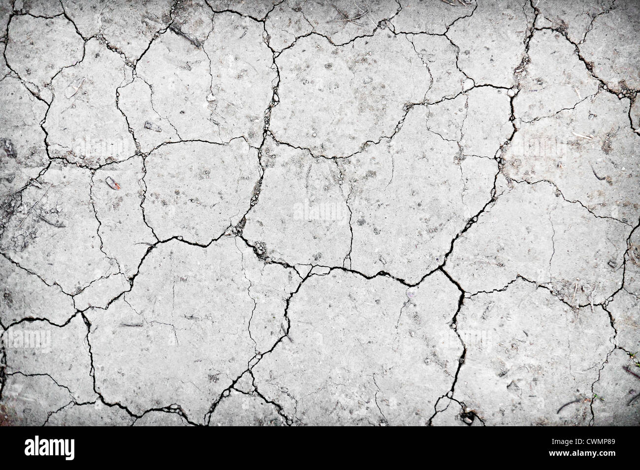 Background of dry cracked soil dirt or earth during drought Stock Photo