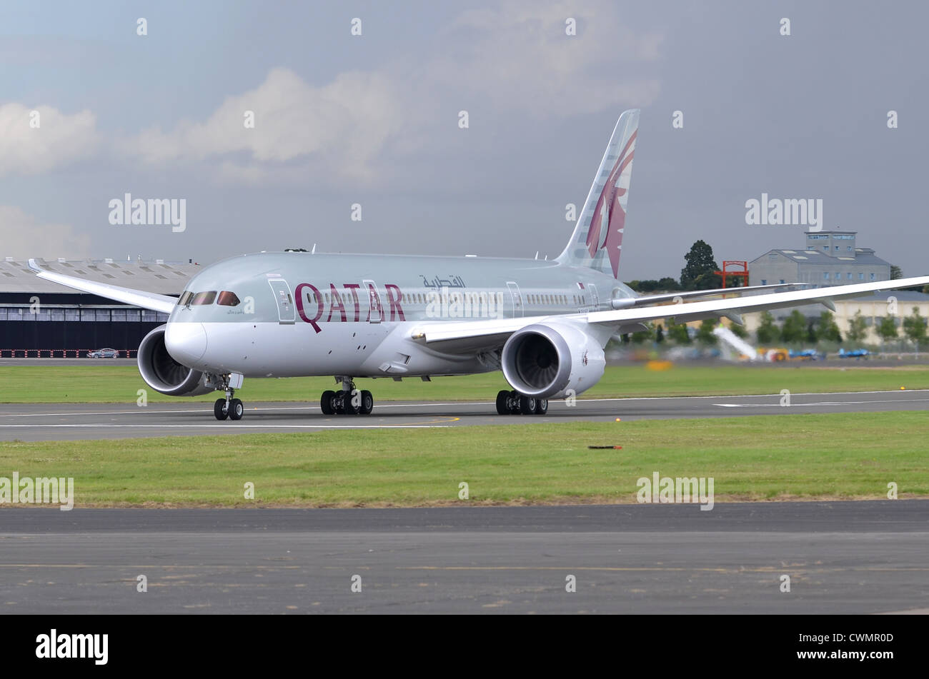 Boeing 787 Dreamliner in the colours of Qatar Airways begnning its take-off run at Farnborough International Airshow 2012 Stock Photo