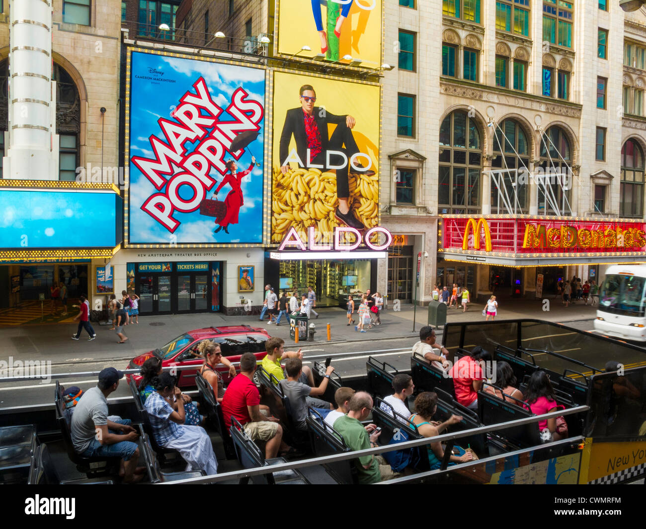 Tour Bus, tourists and Broadway Show Marquees, 42nd Street, NYC Stock Photo