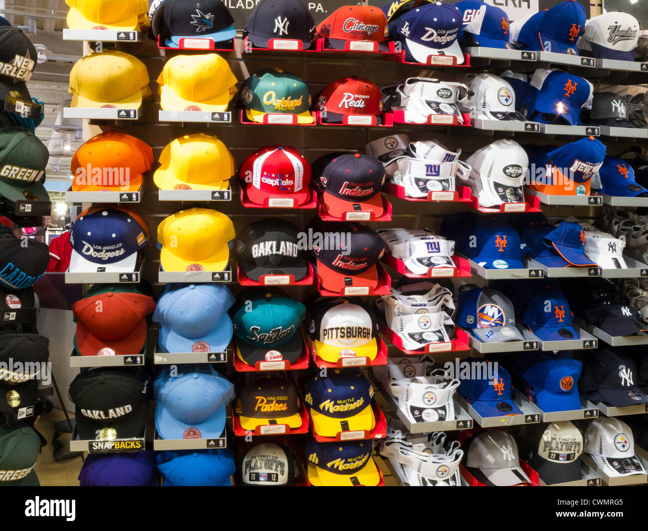 Racks of NFL Team Logo'd Ballcaps, Modell's Sporting Store Interior, NYC Stock Photo - Alamy