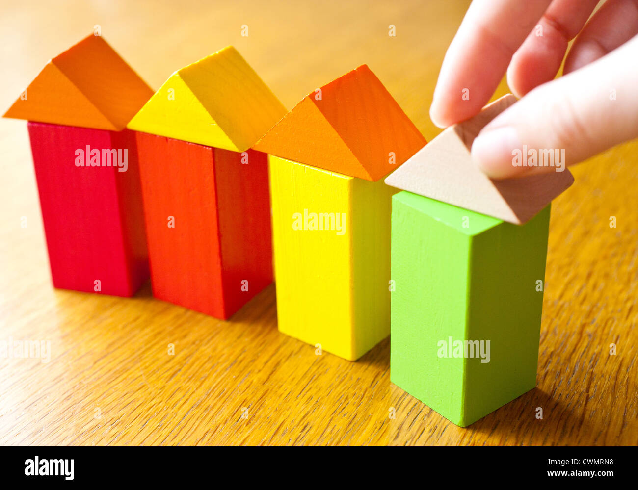 Family house made of wooden blocks - various heating systems Stock Photo