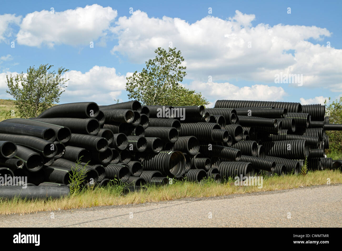 A stockpile of flexible construction conduits Stock Photo