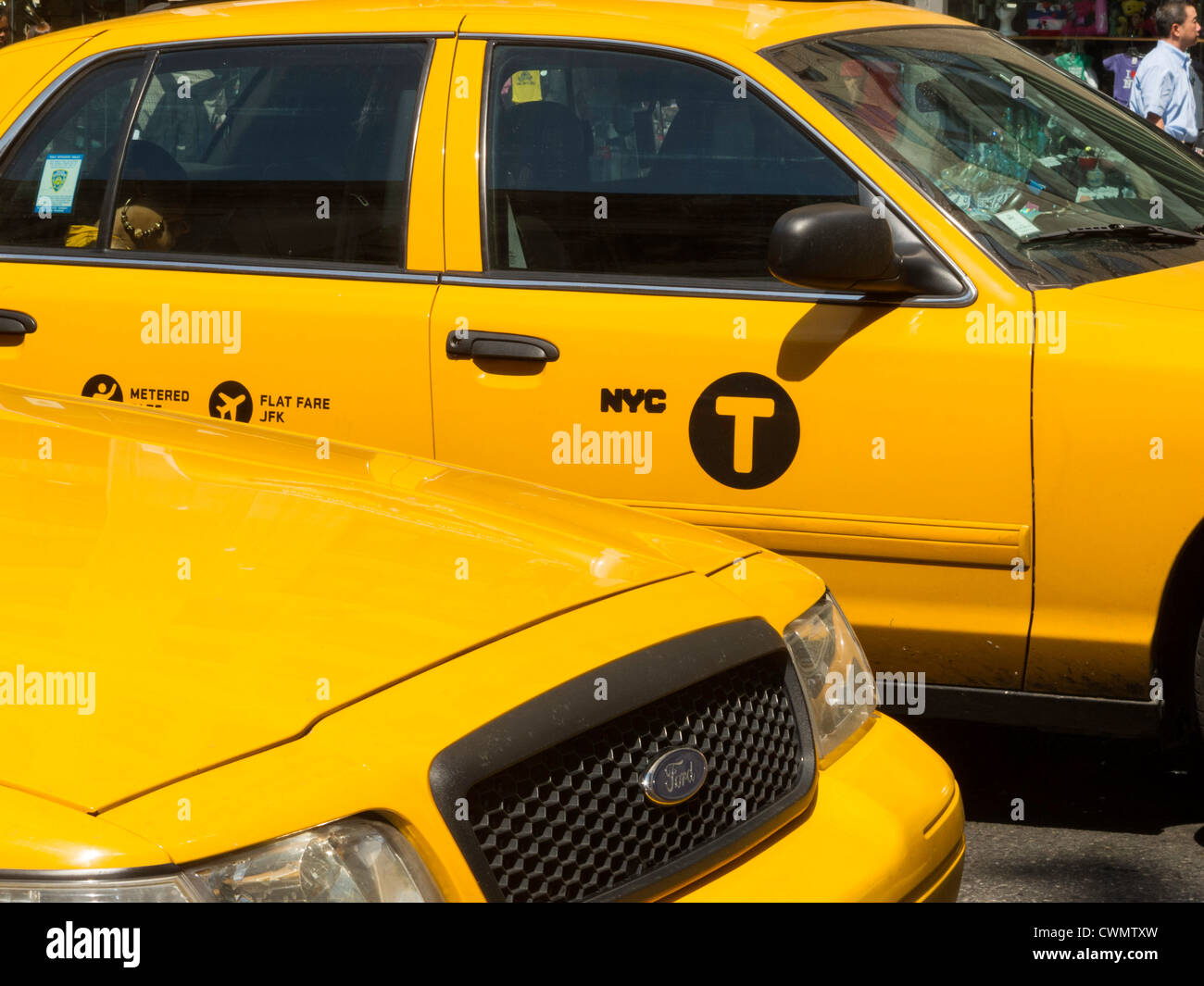 NYC Yellow Taxis featuring the new ' Letter T'  logo Stock Photo