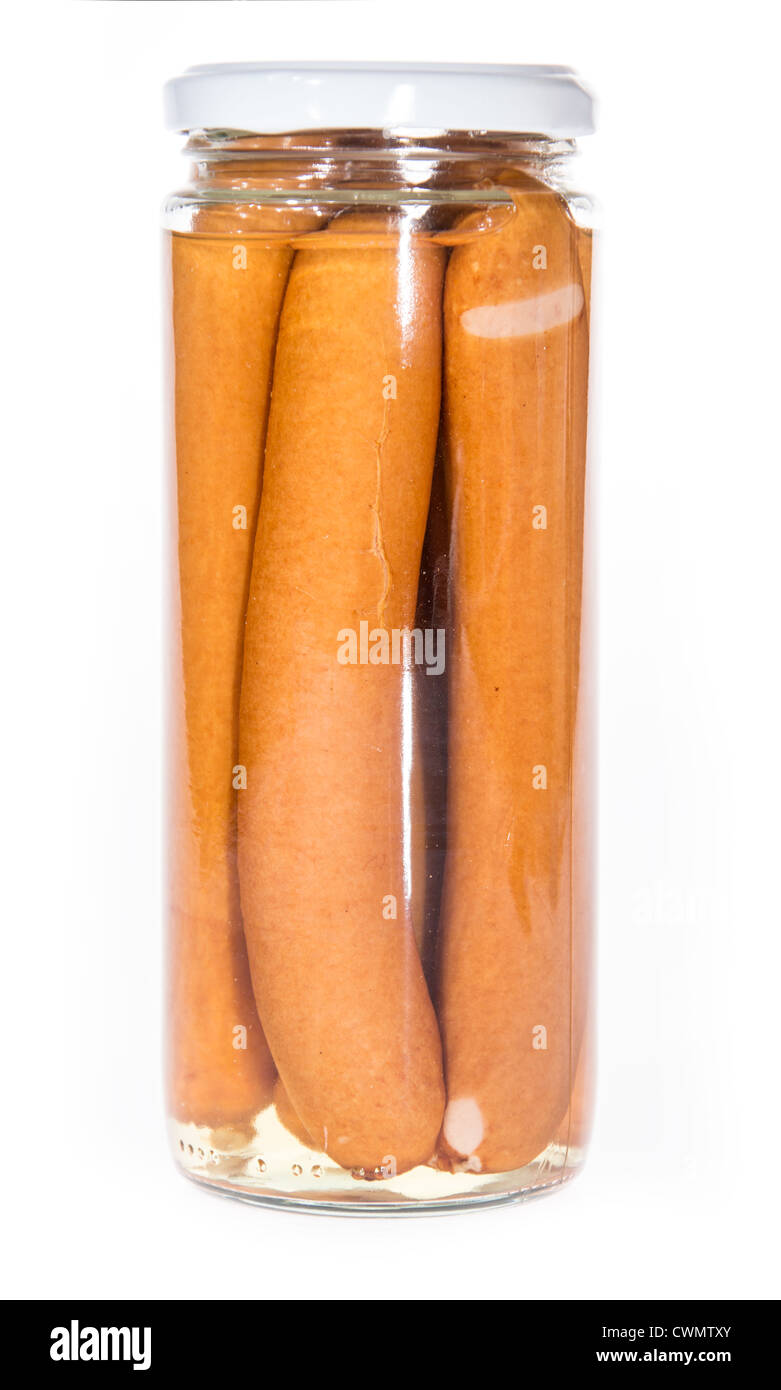 Sausages in a glass isolated on white background Stock Photo